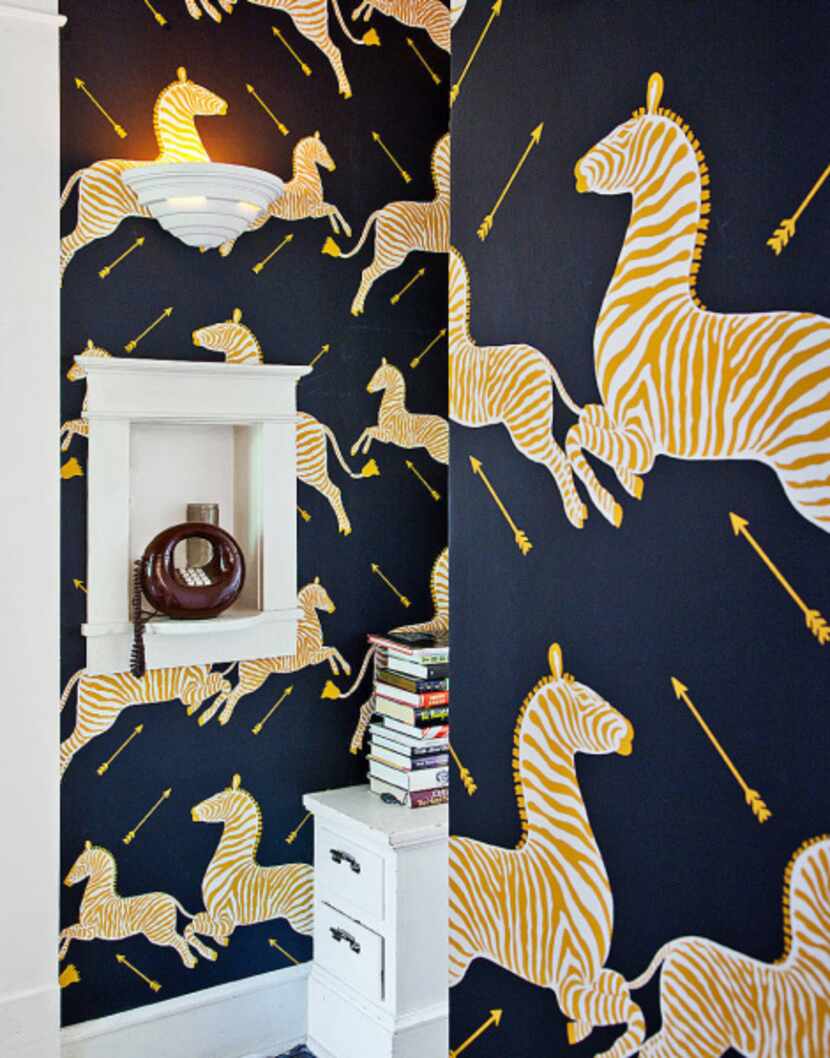 Scalamandré’s Zebras provides the hall's “crazy wallpaper moment.”