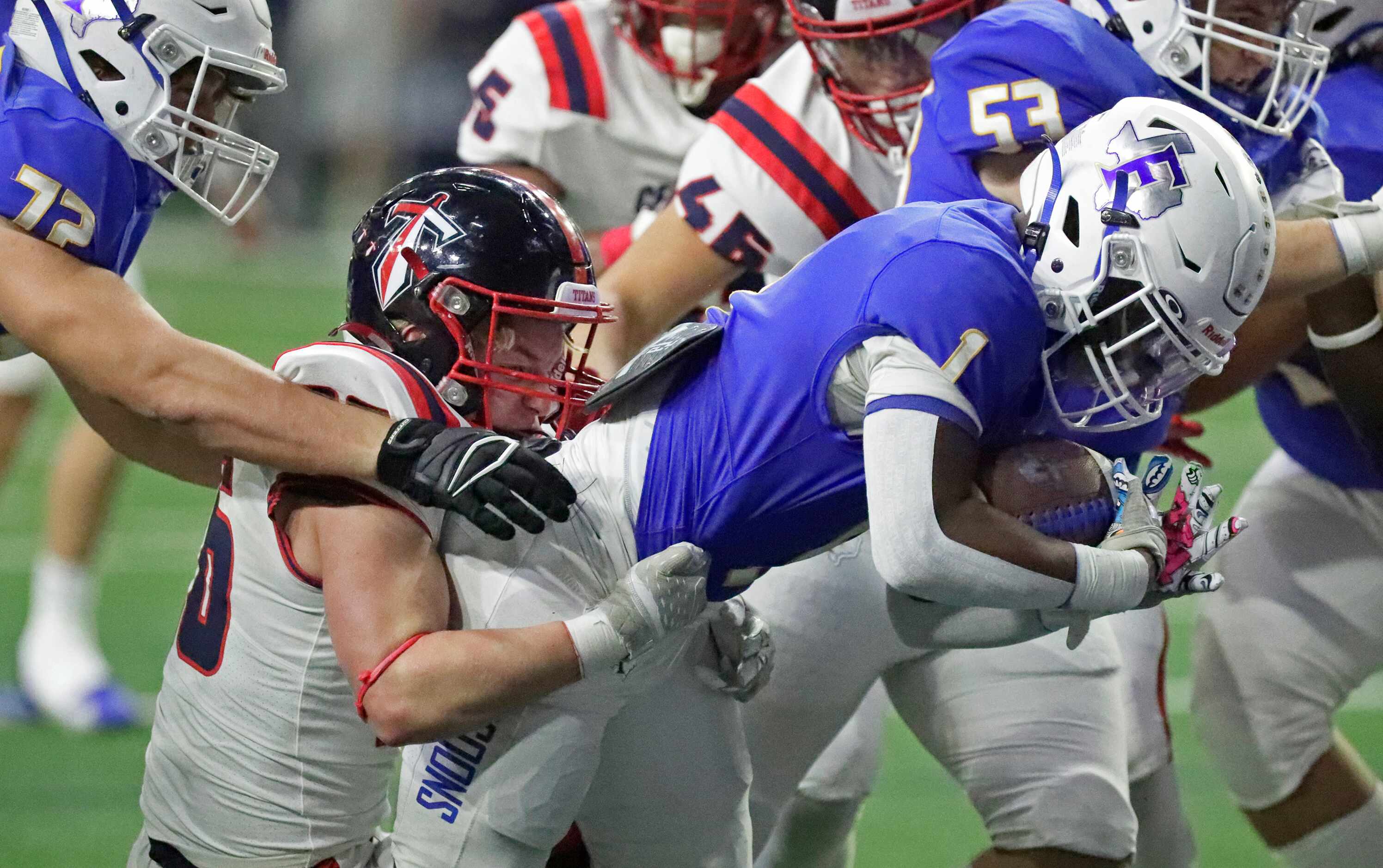 Centennial High School linebacker Miles McInnis (26) was unable to prevent Frisco High...