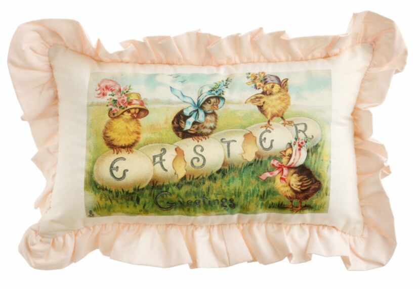 Easter bonnets adorn four sweet chicks on a 10-by-14-inch ruffled cotton pillow. Additional...