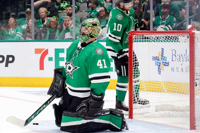 Dallas Stars goaltender Scott Wedgewood (41) kneels in the crease after being scored on by...