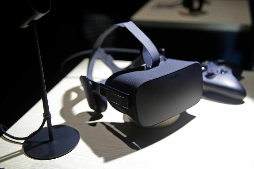 FILE - This June 11, 2015, file photo, shows the new Oculus Rift virtual reality headset on...