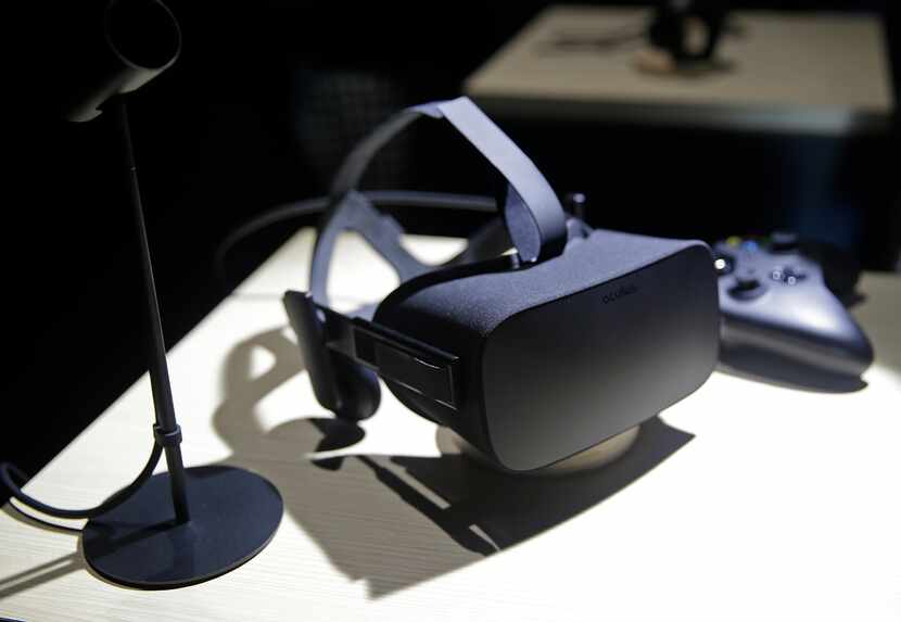 FILE - This June 11, 2015, file photo, shows the new Oculus Rift virtual reality headset on...