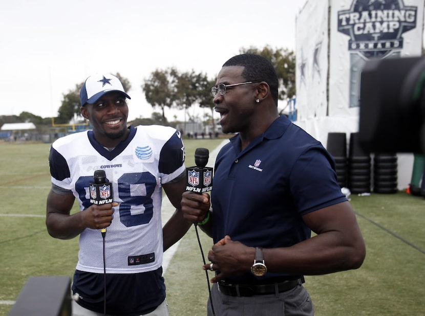 Dallas Cowboys wide receiver Dez Bryant (88) talks with former Dallas Cowboys player Michael...