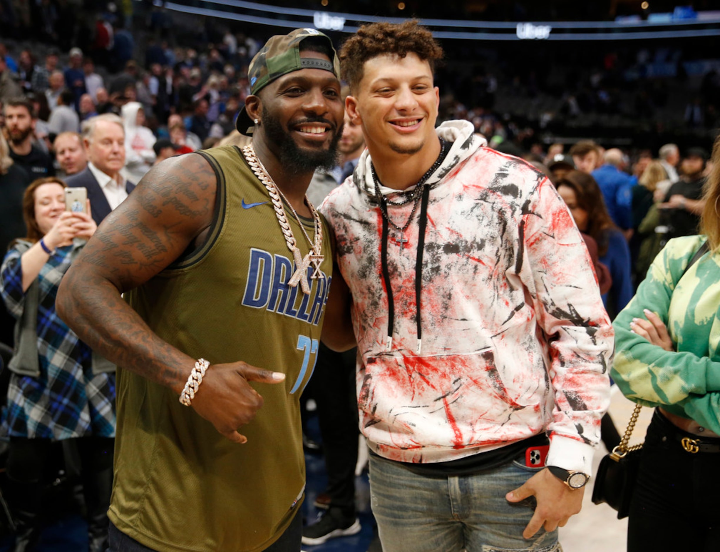 Former Dallas Cowboys player Dez Bryant takes a photo with Kansas City Chiefs quarterback...