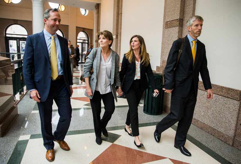 Margo Williams and her daughter, Eve Wiley,  walked with their advisers, Kris Heckmann...