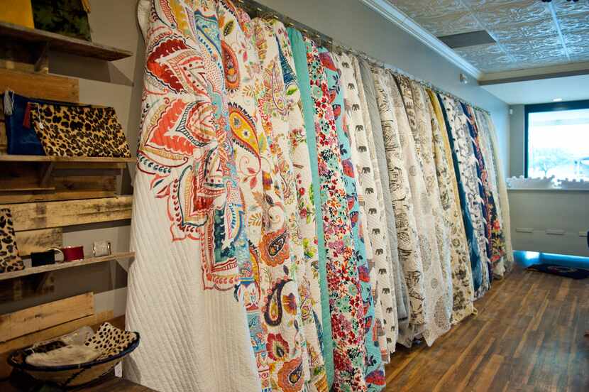 Quilts and pillows from Dallas-based textile maker Ida Mae Home, $69-$200. Preston Royal...