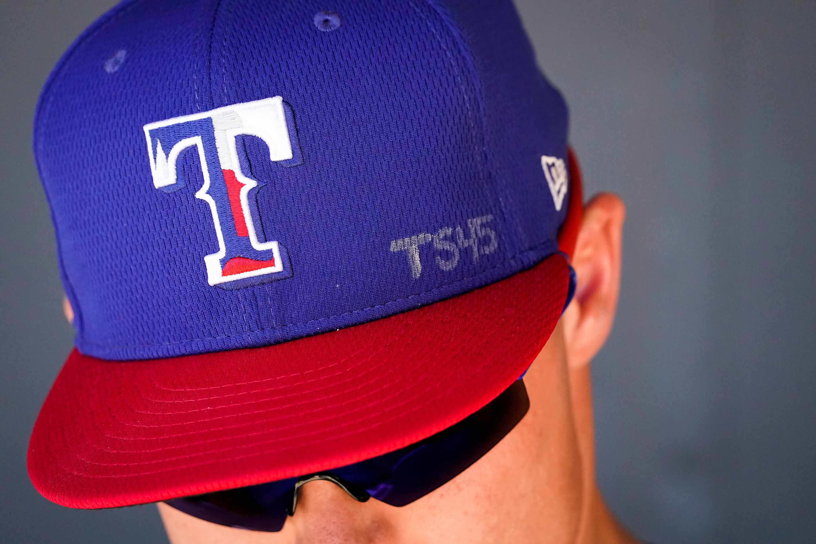 Texas Rangers outfielder Scott Heineman wears the initials of late Los Angeles Angels...