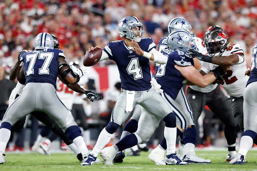 Dallas Cowboys quarterback Dak Prescott (4) throws from the pocket in the first quarter...