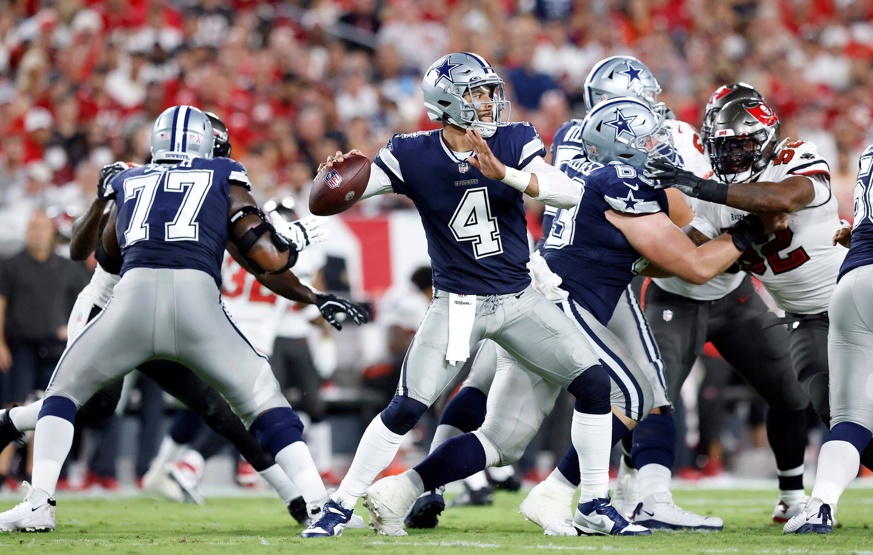 Dallas Cowboys quarterback Dak Prescott (4) throws from the pocket in the first quarter...