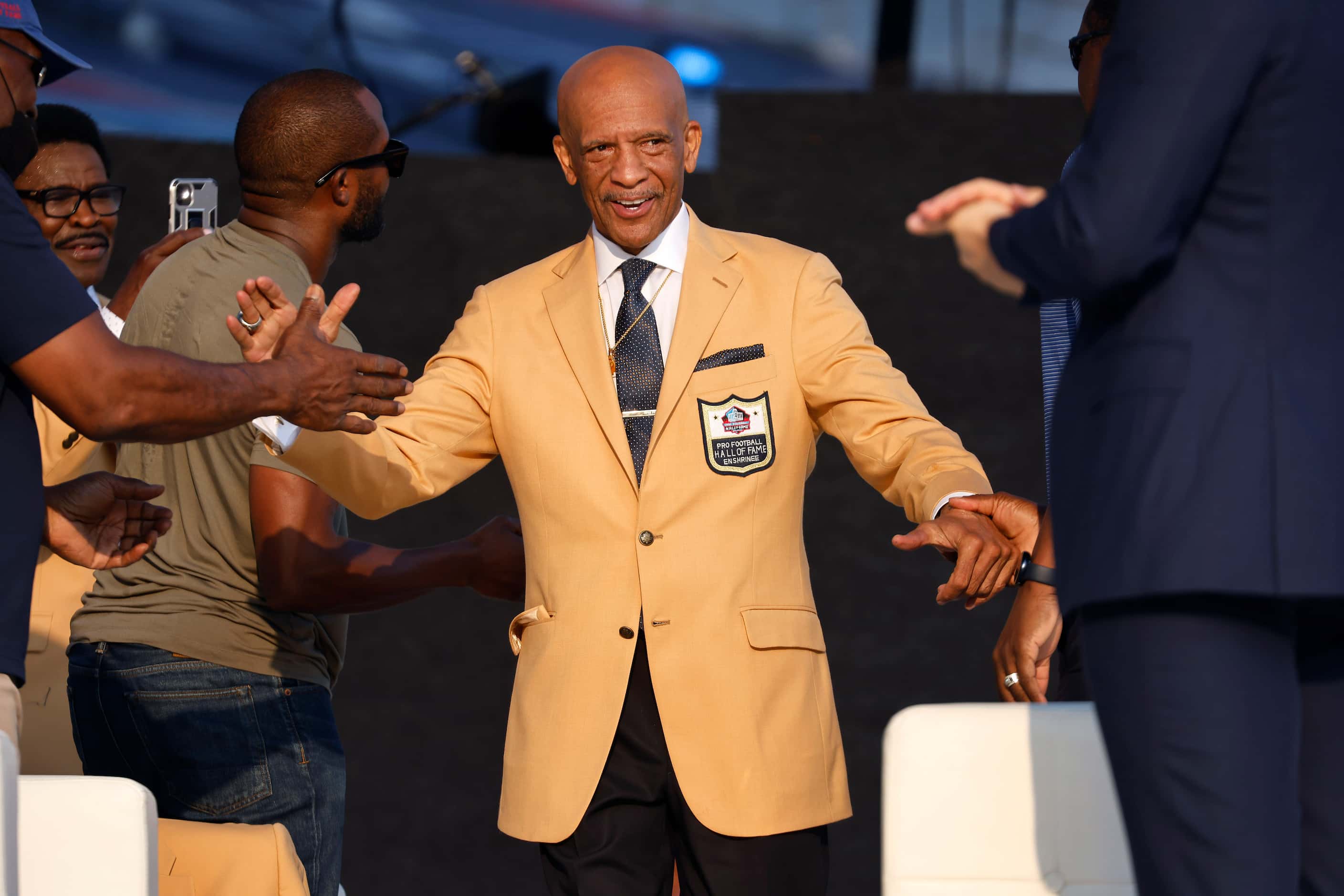 Pro Football Hall of Fame inductee Drew Pearson of the Dallas Cowboys is introduced and...