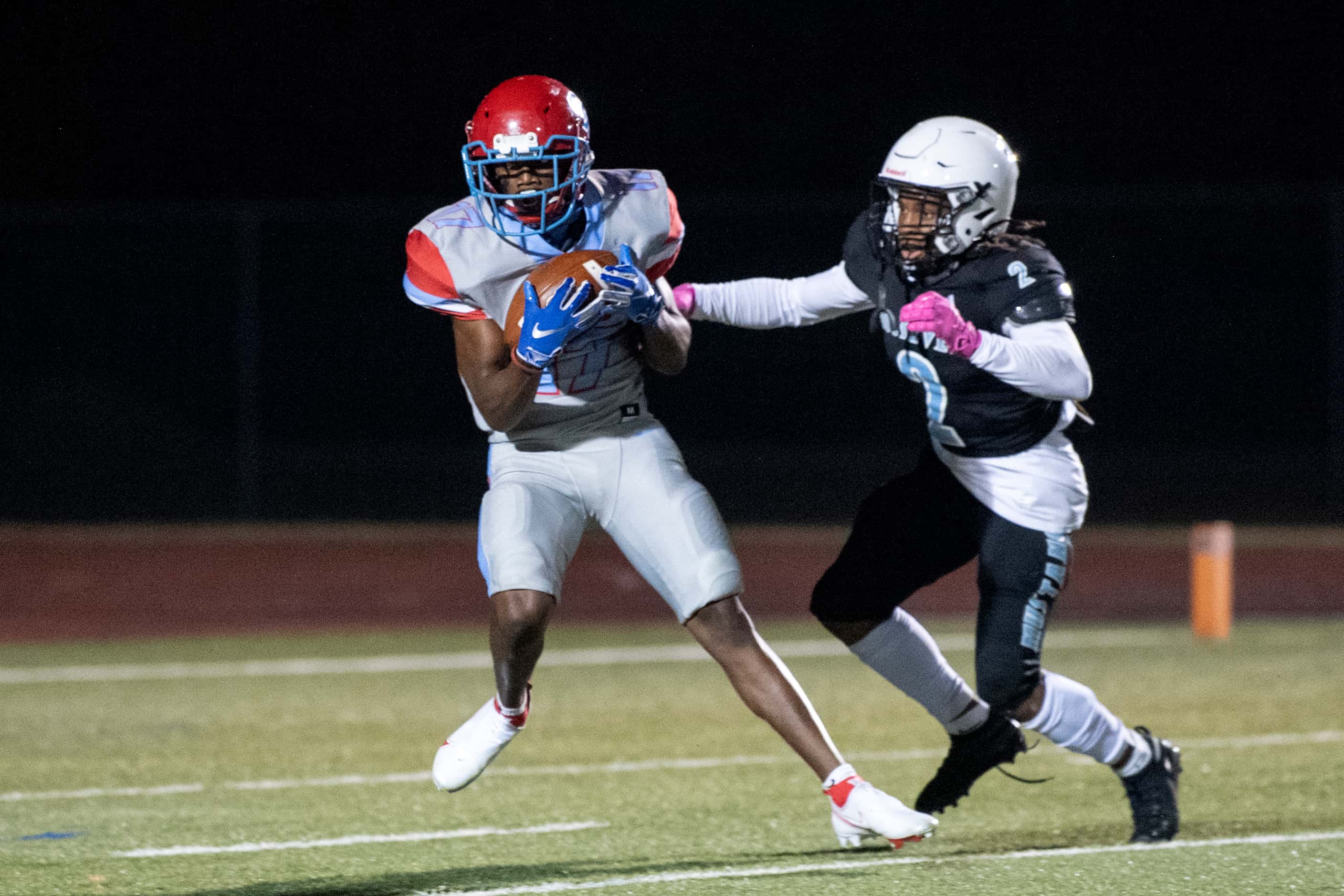 Carter junior wide receiver Jordan Walker (17) hauls in a touchdown reception in front of...