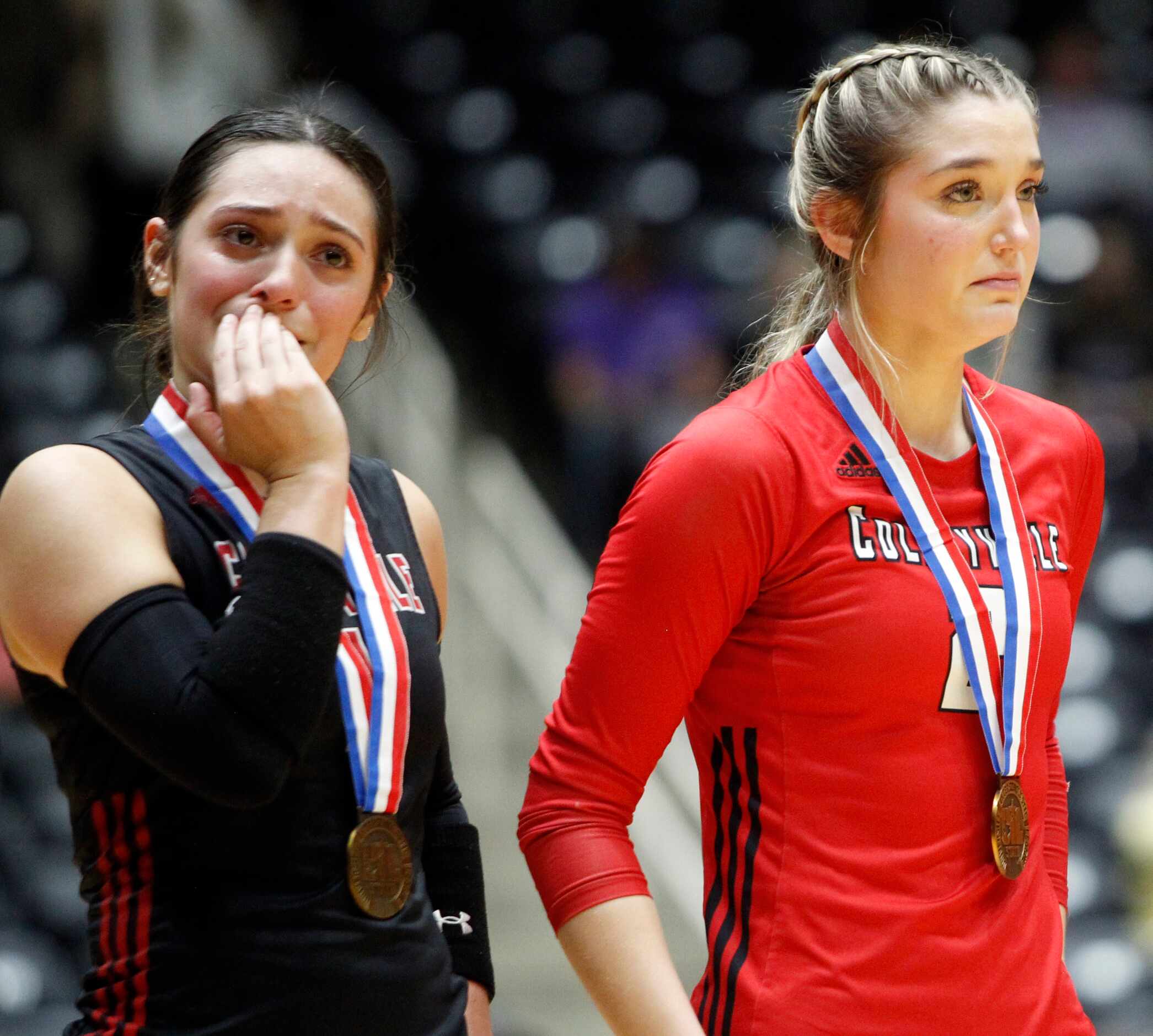 Colleyville Heritage players Sarah Mendoza (1), left and Audrey Popp (2) react after...