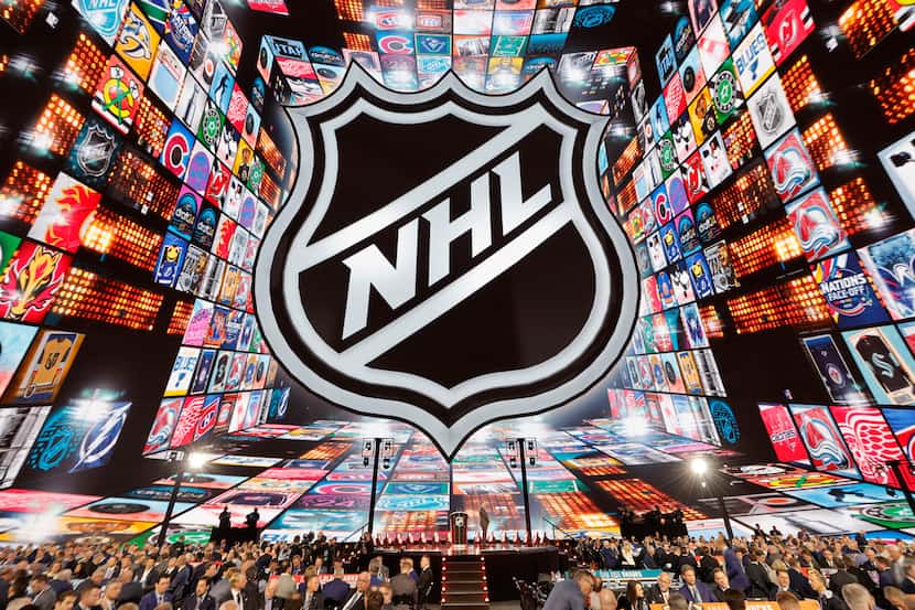 The stage and video screens are seen during the first round of the NHL hockey draft Friday,...