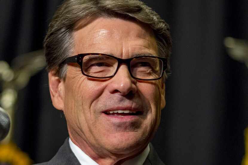 FILE - In this Nov. 7, 2013 file photo, Texas Gov. Rick Perry speaks in Des Moines, Iowa....