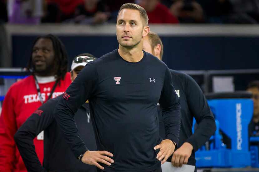 Texas Tech head coach Kliff Kingsbury watches from the sidelines before the Red Raiders'...