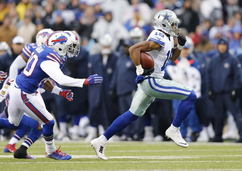 Dallas Cowboys wide receiver Brice Butler (19) runs up the field after the catch in a game...