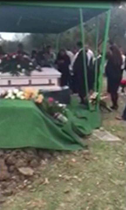  The family says this was a screenshot of a short video of the second funeral, which they...