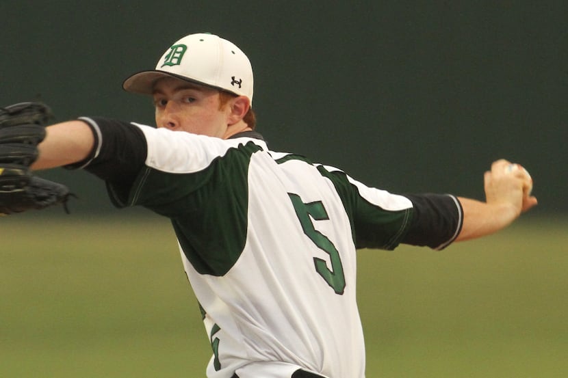 Southlake Carroll pitcher Ben Leeper (5) completes his first strikeout as he faced a  Flower...