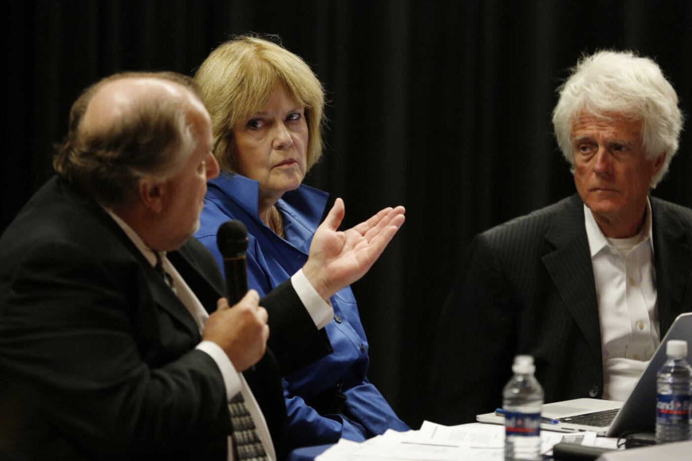 Mary Suhm (center), former City Manager of Dallas, and Craig Holcomb (right), executive...