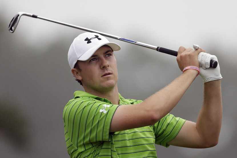 Jordan Spieth watches his tee shot from 16 during the third round of the Wyndham...