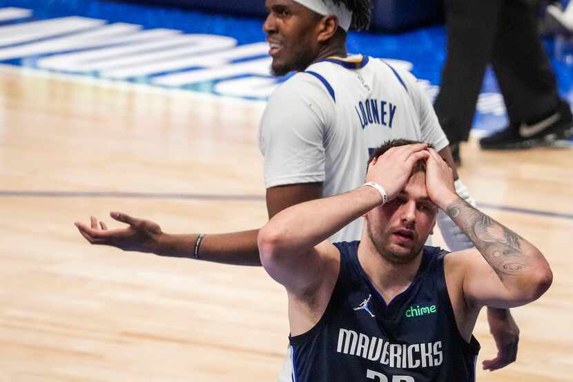 Dallas Mavericks guard Luka Doncic (77) reacts after being fouled by Golden State Warriors...