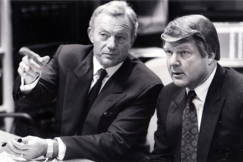 Dallas Cowboys owner Jerry Jones (left) and coach Jimmy Johnson plot their draft strategy...