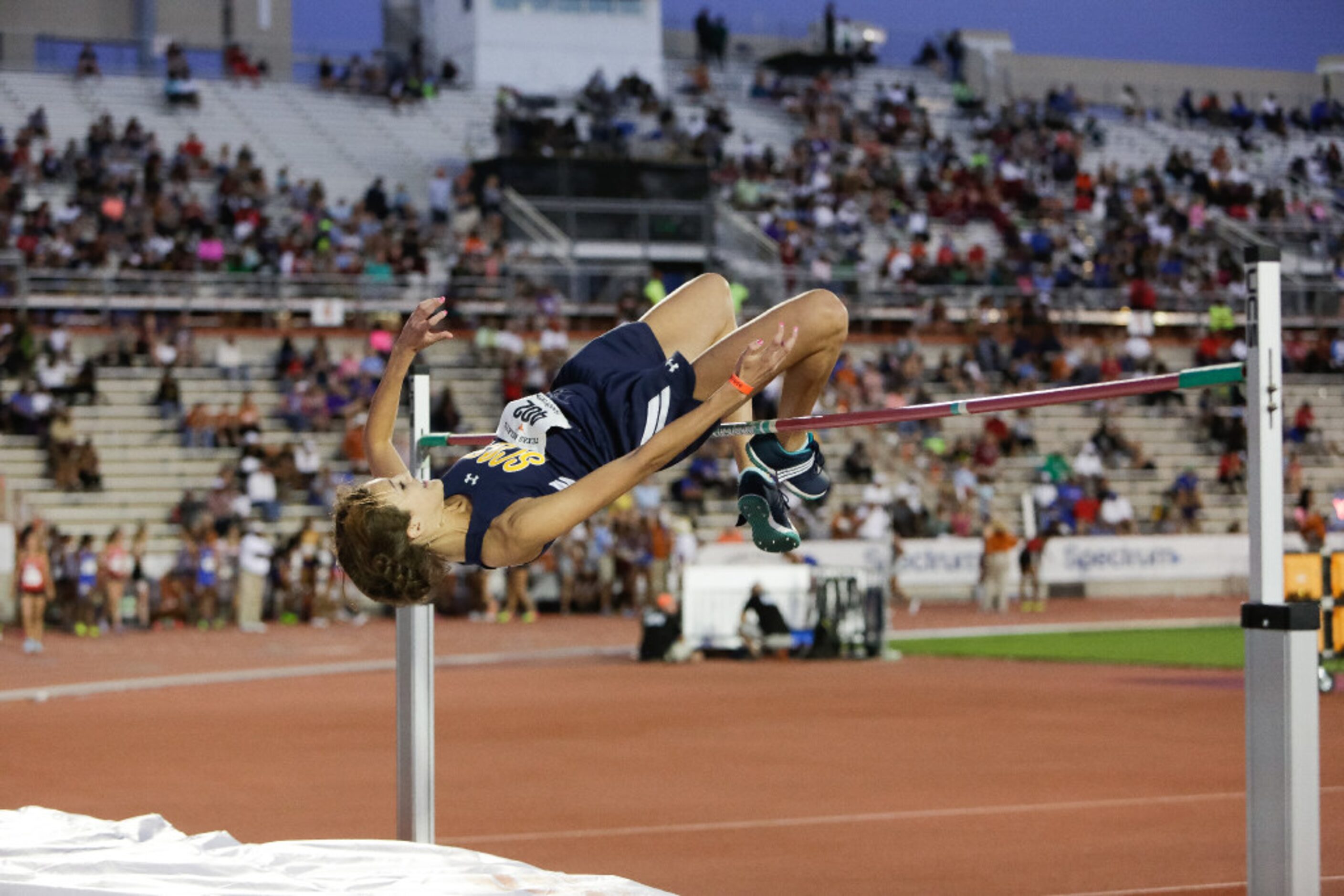 Dallas Highland Park senior Falyn Reaugh smiles after clearing the bar at a height of 6'0"...