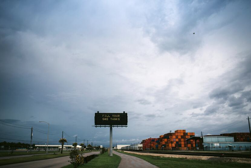 Roadside signs warned drivers of Hurricane Harvey's approach near the Houston Ship Channel....