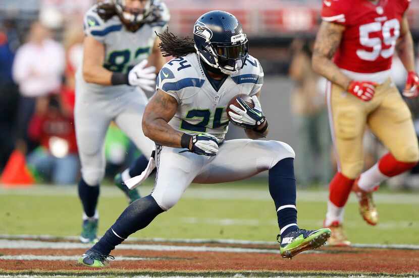 SANTA CLARA, CA - OCTOBER 22:  Marshawn Lynch #24 of the Seattle Seahawks rushes with the...