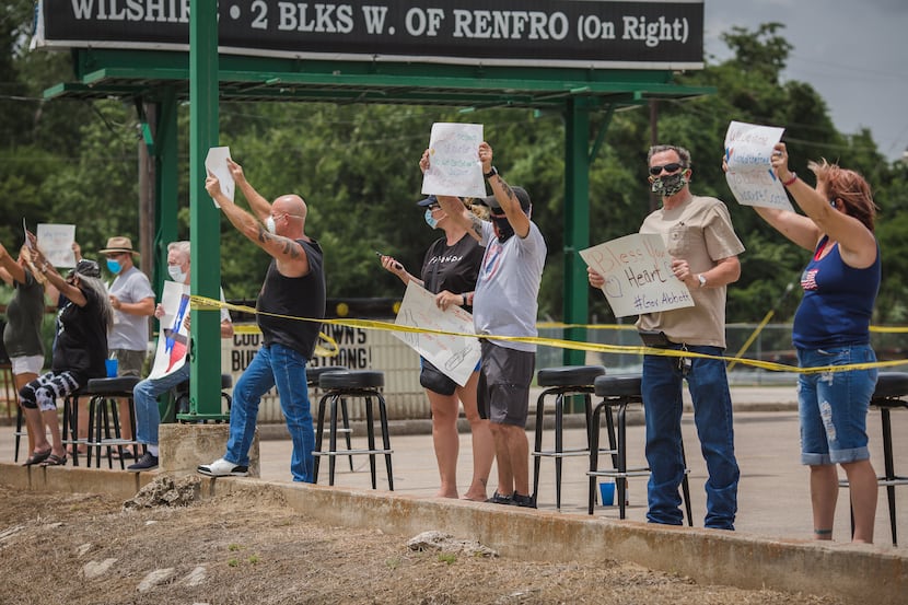 The owner of Cooter Brown's in Burleson hosted a protest Sunday, June 28, 2020 to send a...