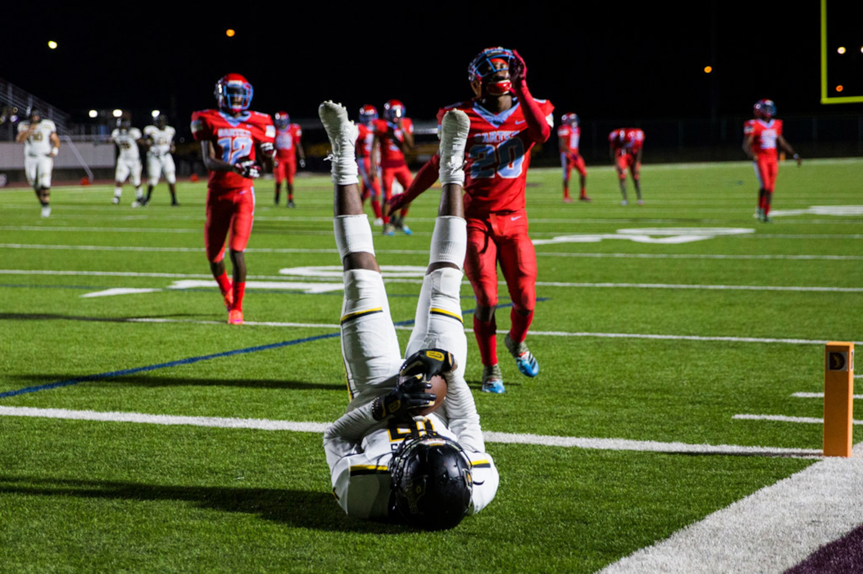 Crandall wide receiver Jeremiah Contreras (16) catches a pass in the end zone for a...