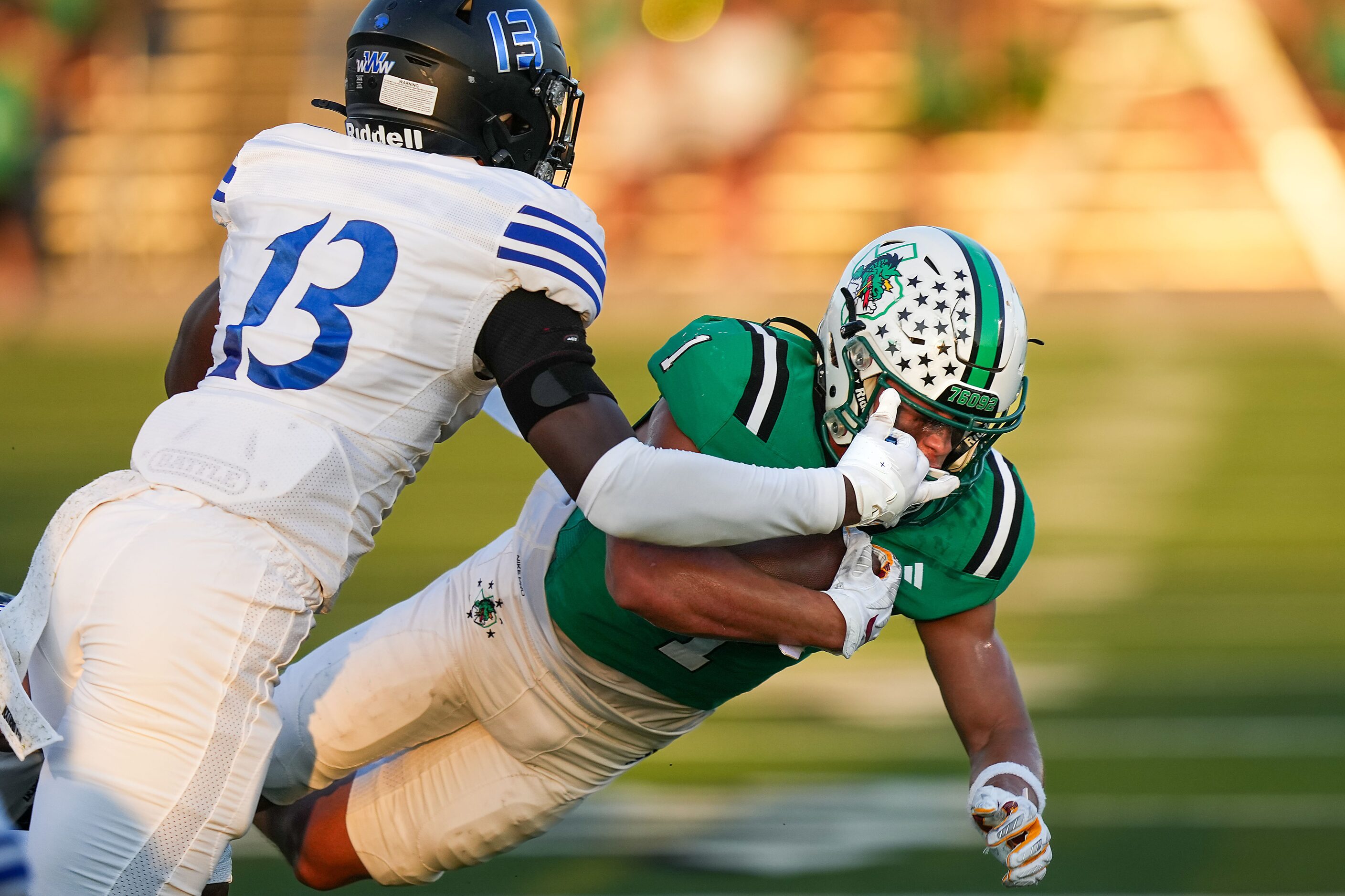 Southlake Carroll running back Riley Wormley (1) is brought down by Trophy Club Byron...