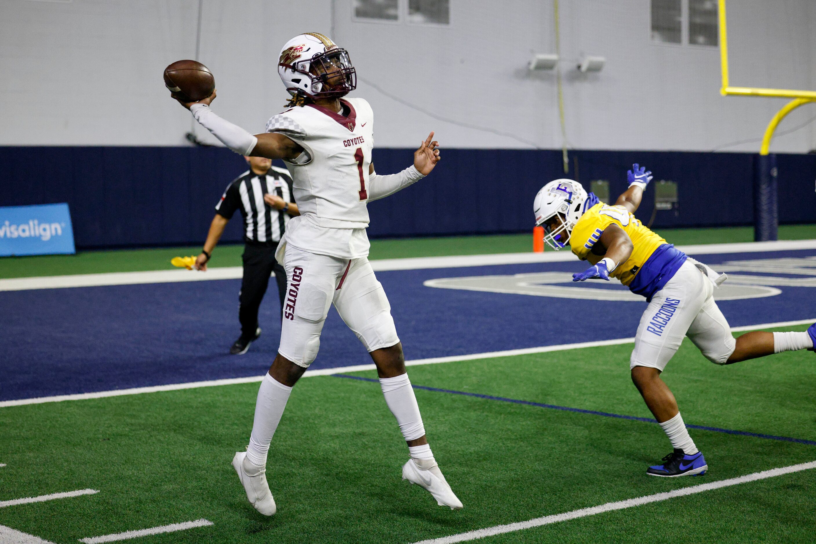 Frisco Heritage quarterback Kameron Franklin (1) throws a pass while under pressure from a...