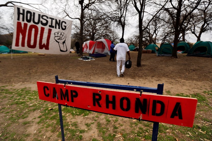 Between 30-40 people without housing setup Camp Rhonda adjacent to Pioneer Park Cemetery in...