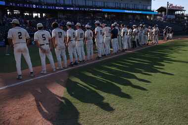 Flower Mound players line up for their runner-up medals following their season ending 2-1...