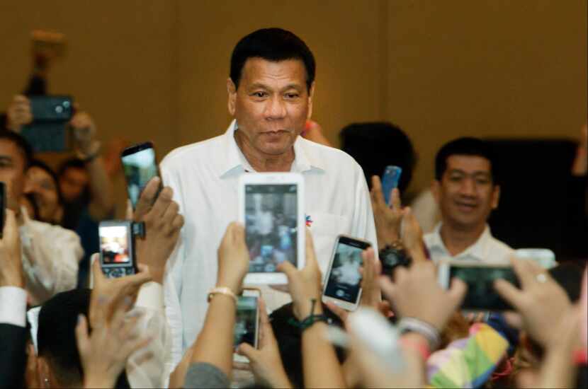 Philippine President Rodrigo Duterte, arrives a meeting with the Filipino community, in...