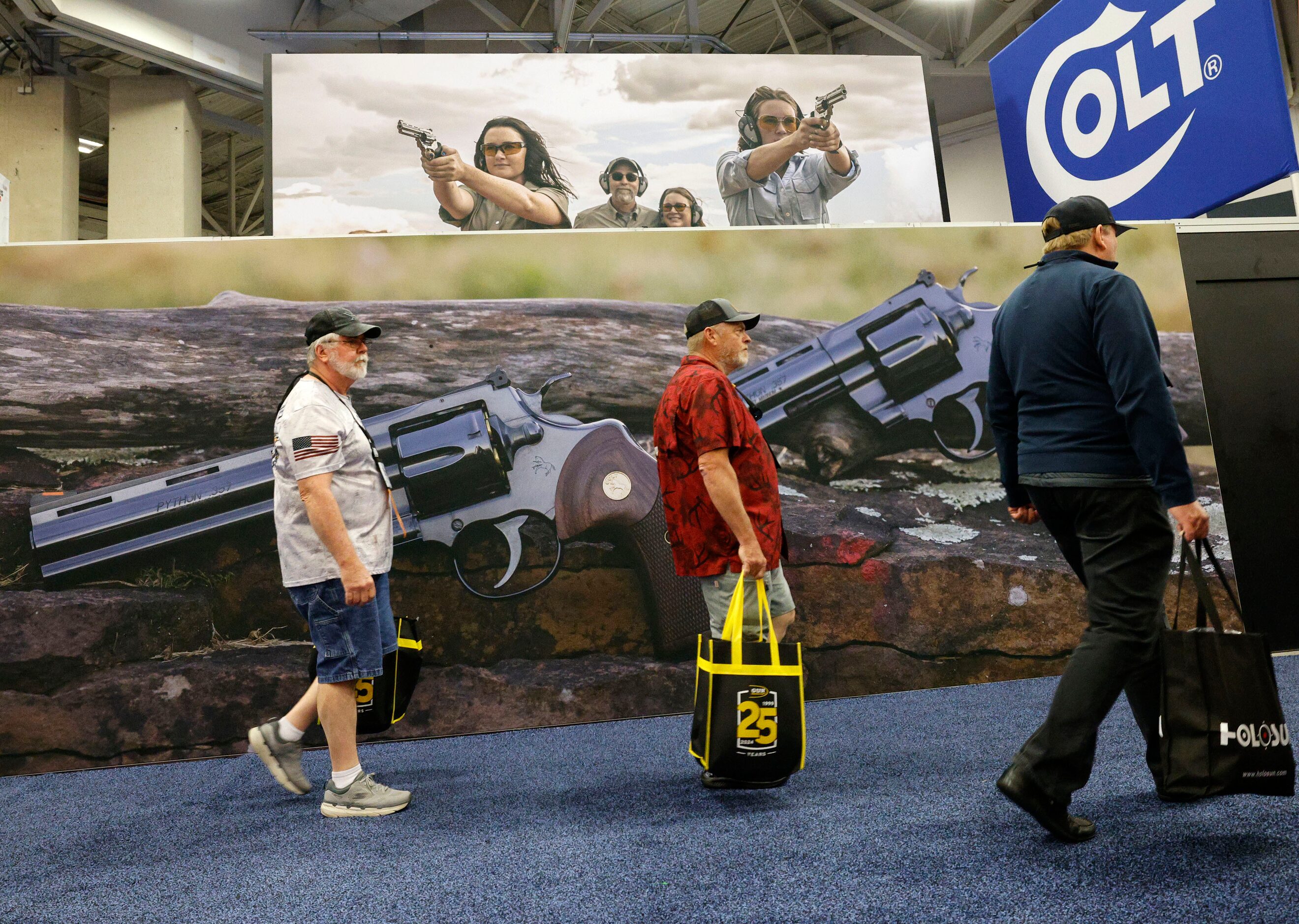 Visitors walk around during 2024 NRA Annual Meetings & Exhibits at Kay Bailey Hutchison...