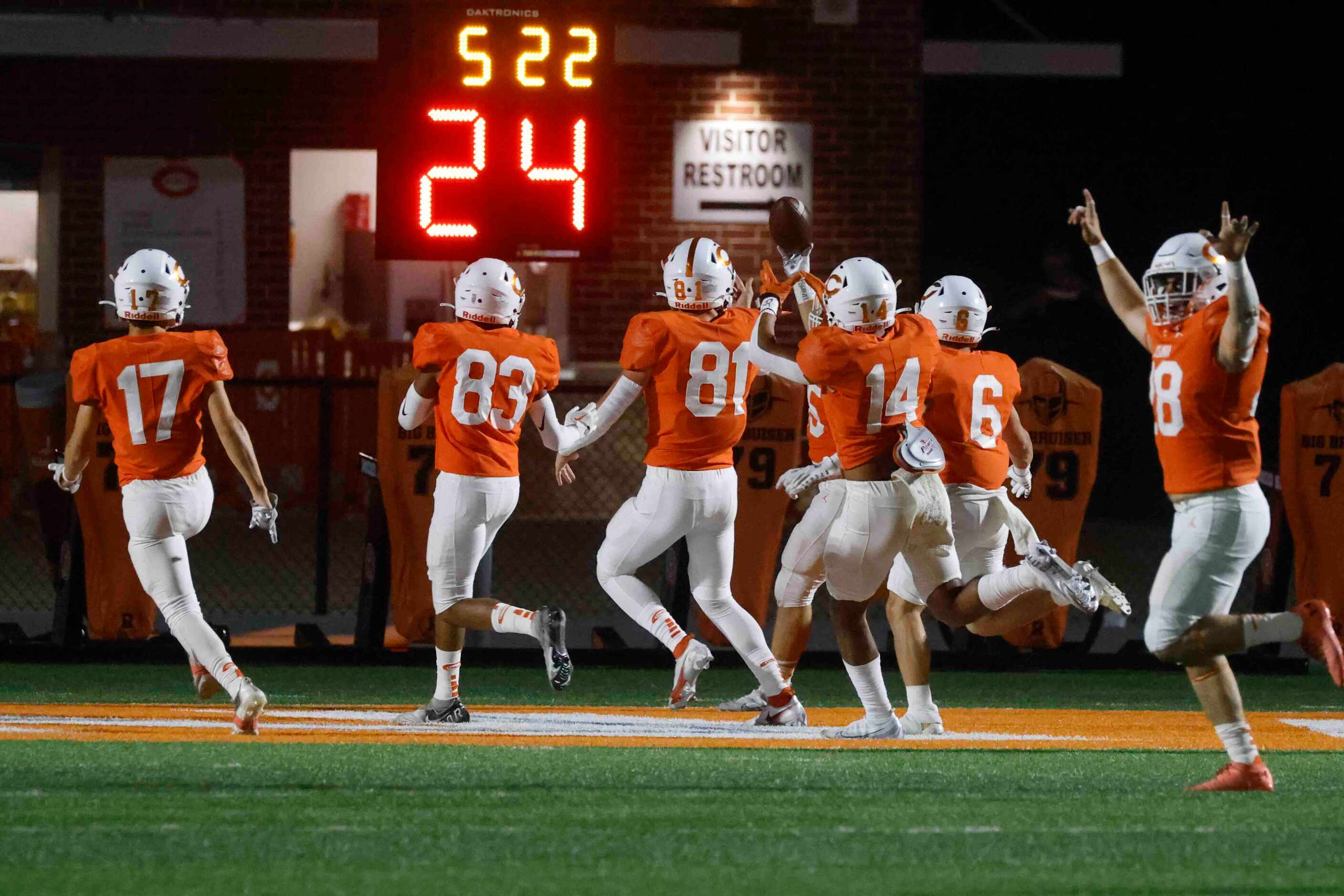 Celina High School celebrates a touchdown during the first half of a football game against...