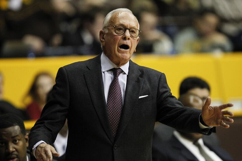 Dec 20, 2013; Laramie, WY, USA; Southern Methodist Mustangs head coach Larry Brown reacts...