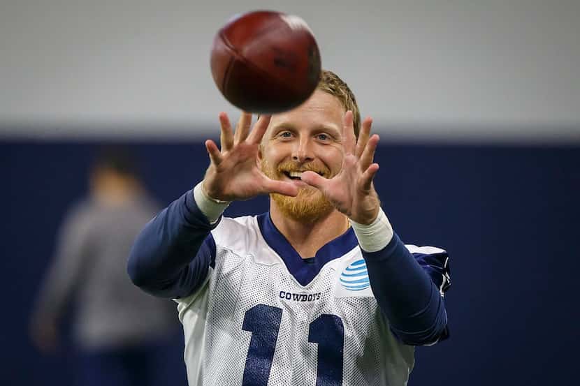 Dallas Cowboys wide receiver Cole Beasley (11) warms up during the team's  training camp...