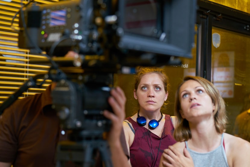 Writer and director Augustine Frizzell (center) checks out a shot during filming of "Never...