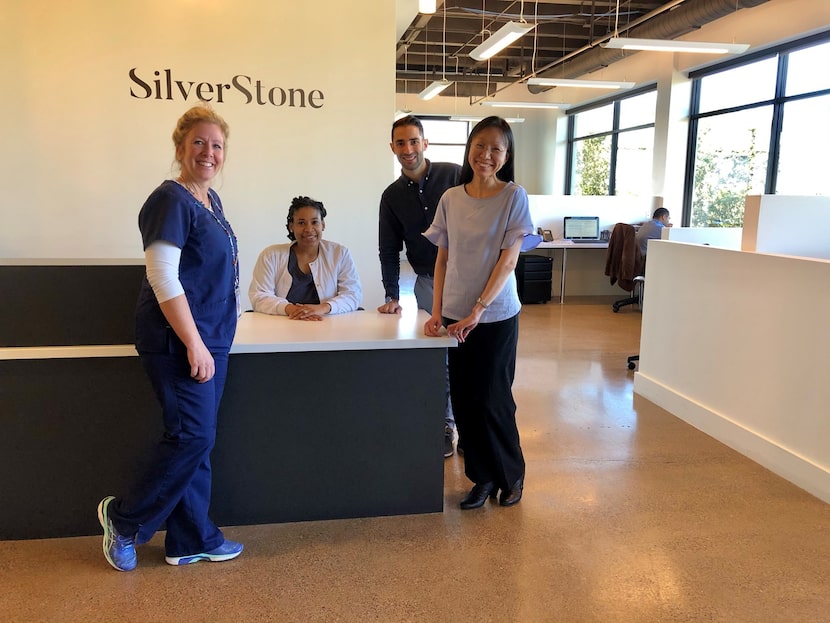 Members of the SilverStone Hospice staff poses for a photo together.