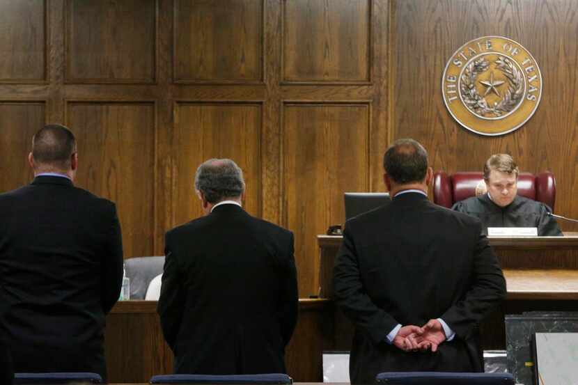 
State District Judge Jason Cashon reads the sentence of guilty at the capital murder trial...