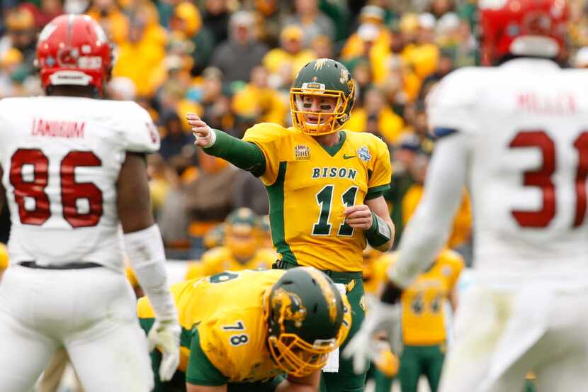 Jan 9, 2016; Frisco, TX, USA;  North Dakota State Bison quarterback Carson Wentz (11) calls...