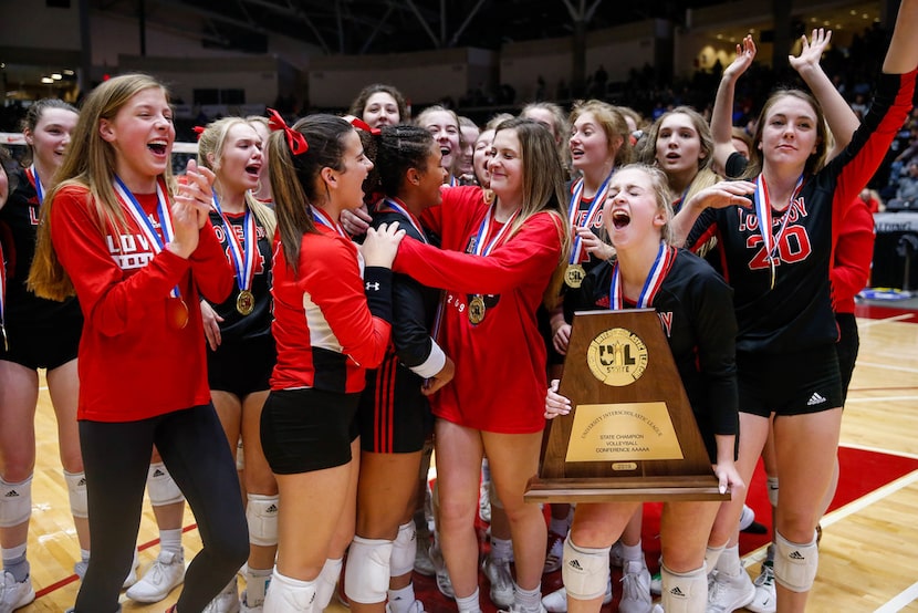 The Lucas Lovejoy Leopards celebrate after winning a class 5A volleyball state semifinal...