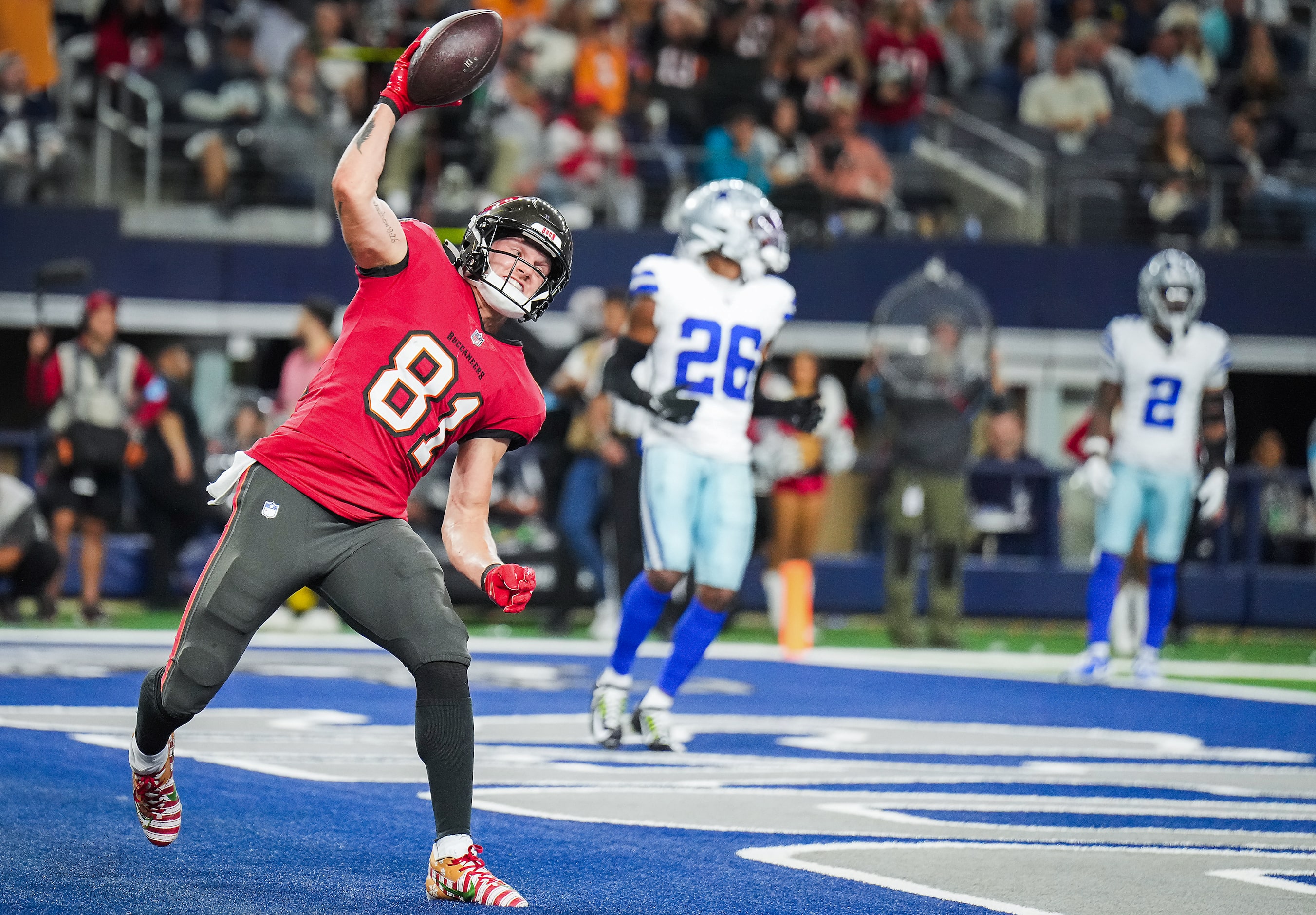 Tampa Bay Buccaneers wide receiver Ryan Miller (81) spikes the ball after scoring on a...