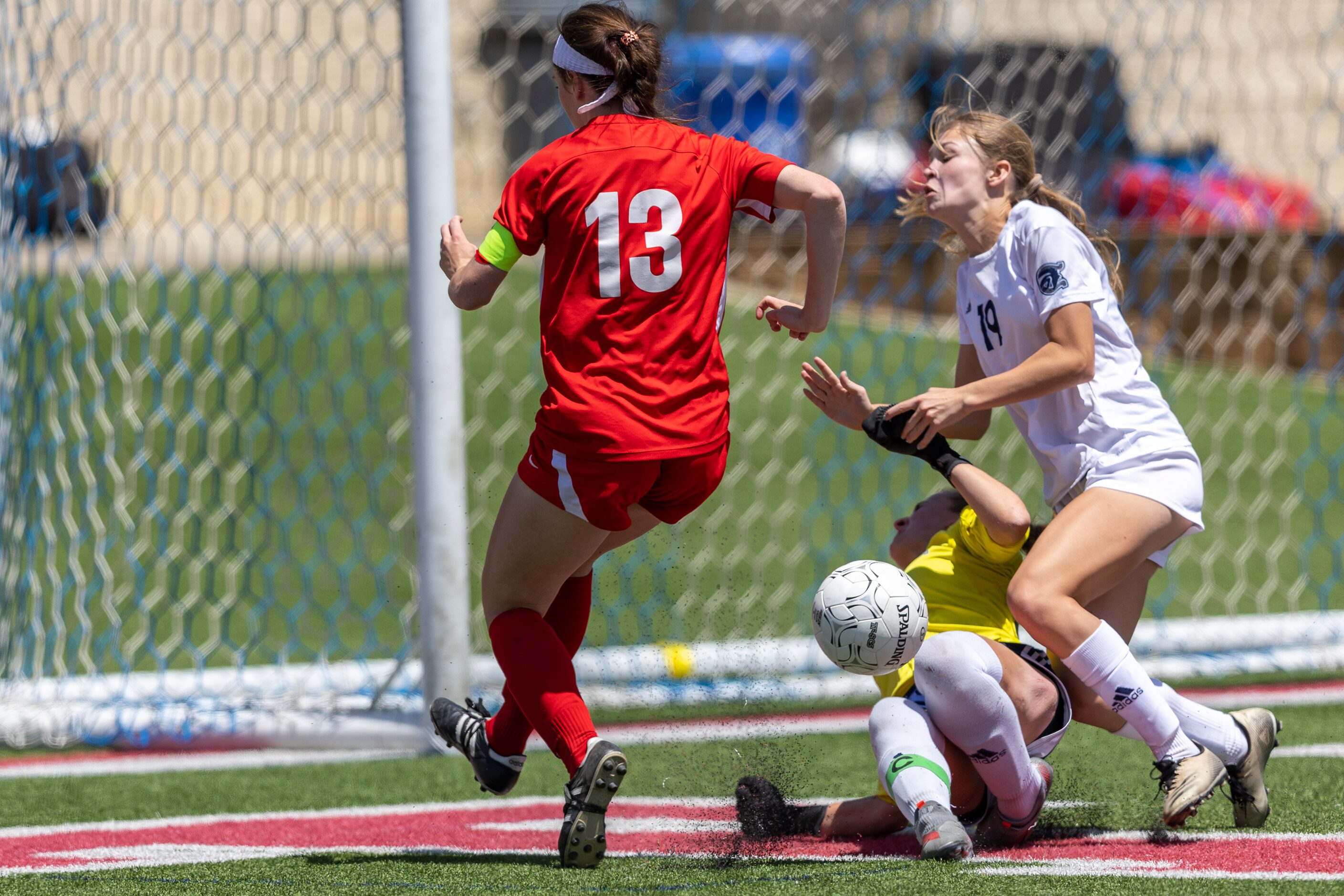 Grapevine midfielder Kasten Merrill takes a shot on goal past Boerne Champion defender Sam...