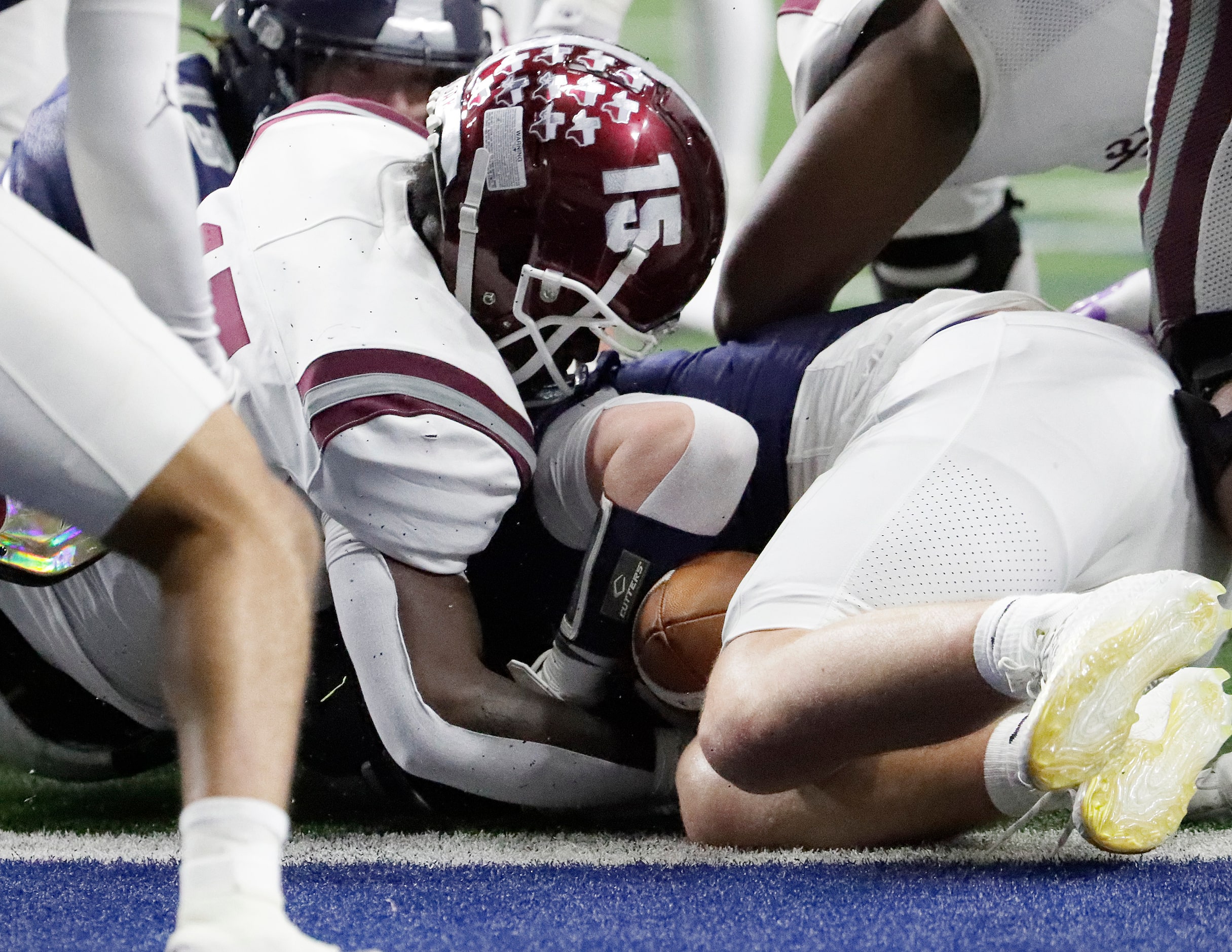 Red Oak High School running back Kingston McAdams (15) looses the football on the half yard...