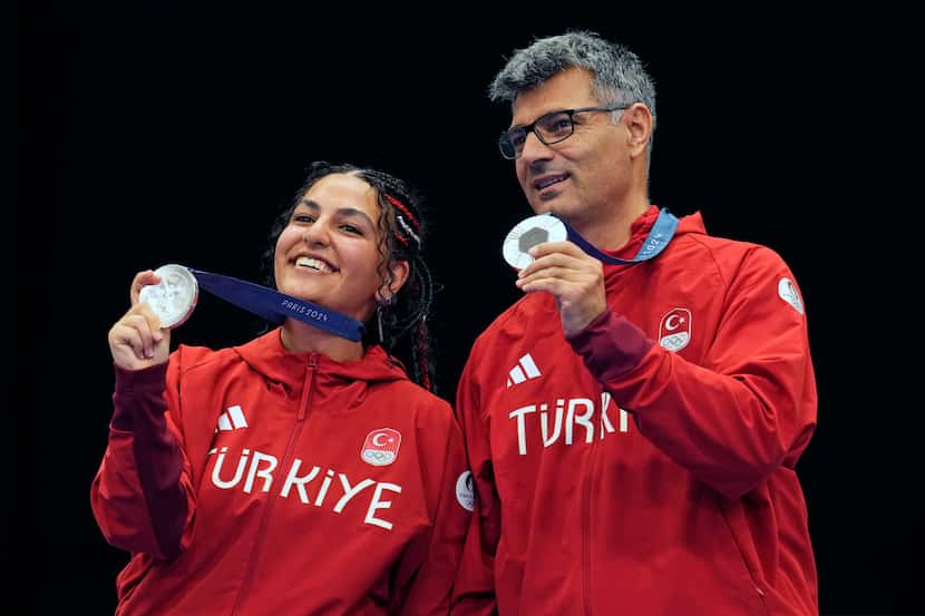 Turkey's Savval Ilayda Tarhan and Yususf Dikec won  the silver medal in the 10m air pistol...