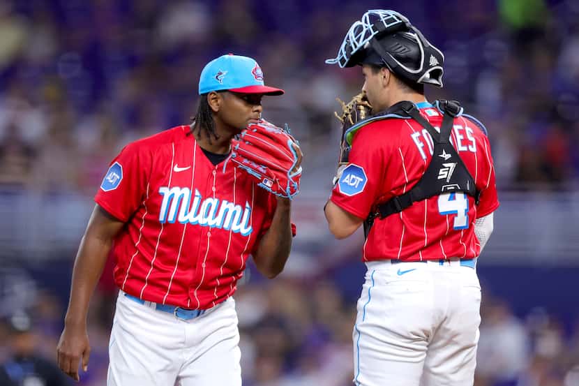 Edward Cabrera (left) and Nick Fortes, wearing the Miami Marlins' MLB City Connect uniforms,...